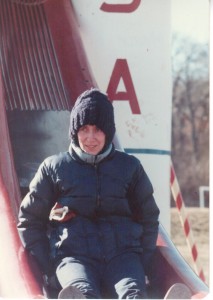 My mom sliding down from  the rocket ship at the park in Webster Groves