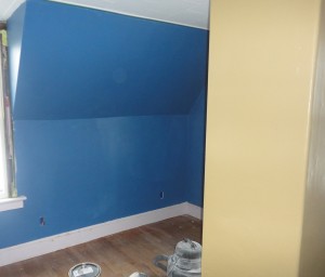 Will's room with a first coat of paint on the walls. The chimney in the foreground is the accent color