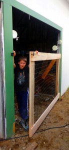 Will helping show off the new dog pen door.