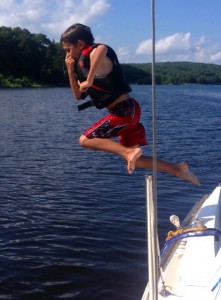 Ben jumping off the boat