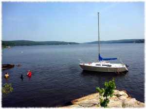 The view of the sailboat at anchor from our picnic spot