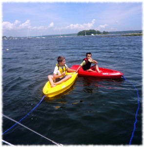 The boys eating lunch on their kayaks (while tied to the boat) - Pine Island