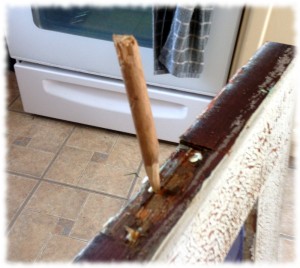 Filling the screw holes from the original hinges on the door to the sun porch