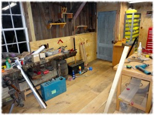 Back of the workshop with the new floor and walls.