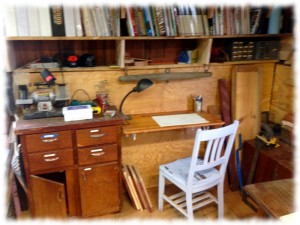 New desk height shelf in the corner of the workshop. Under the 10,000 woodworking books/magazines I have.