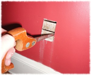 Carefully cutting the lath boards.