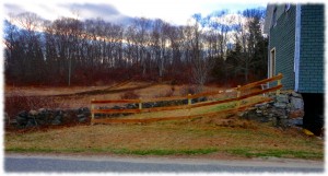 The new fence, ready to let the weather gray the wood.