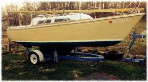 The boat with the first coat of the new (green) bottom paint. 