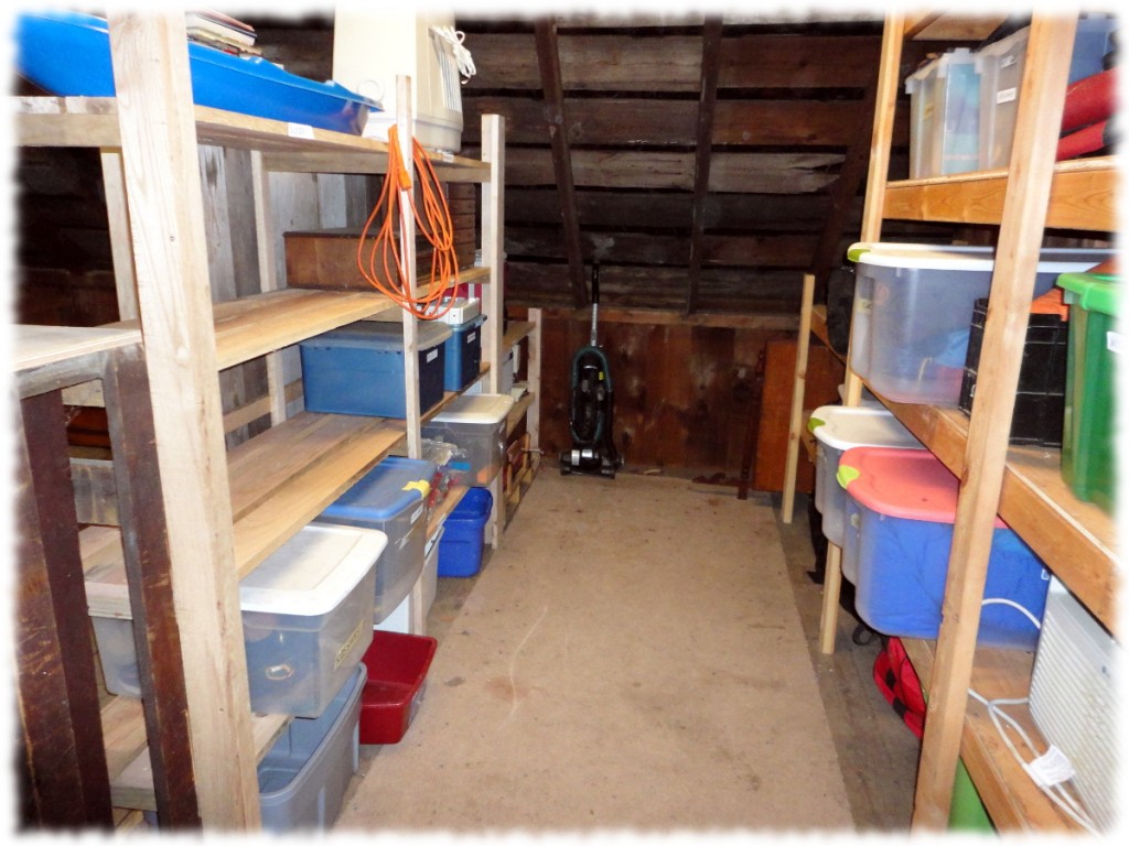 The original shelves are to the right. The new shelves are on the left (the reading corner is on the other side of the shelves on the left). The new shelves are made from a bunch of maple and oak lumber I have left over from last summer.