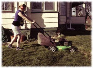 Susanna mowing the grass..