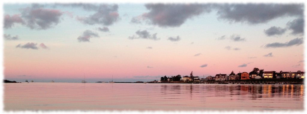 The sunrise over Giants Neck beach and our anchorage. You can see our boat on the horizon.