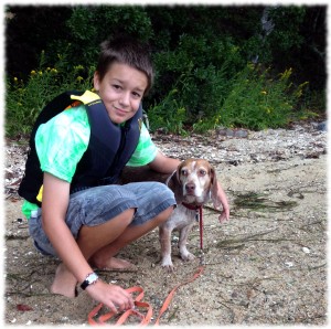 Will walking Tucker on Saturday morning after sleeping on the sailboat.