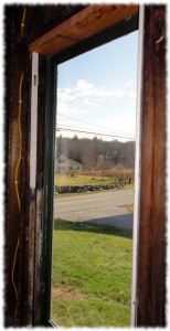 Window repaired with the storm window reinstalled.