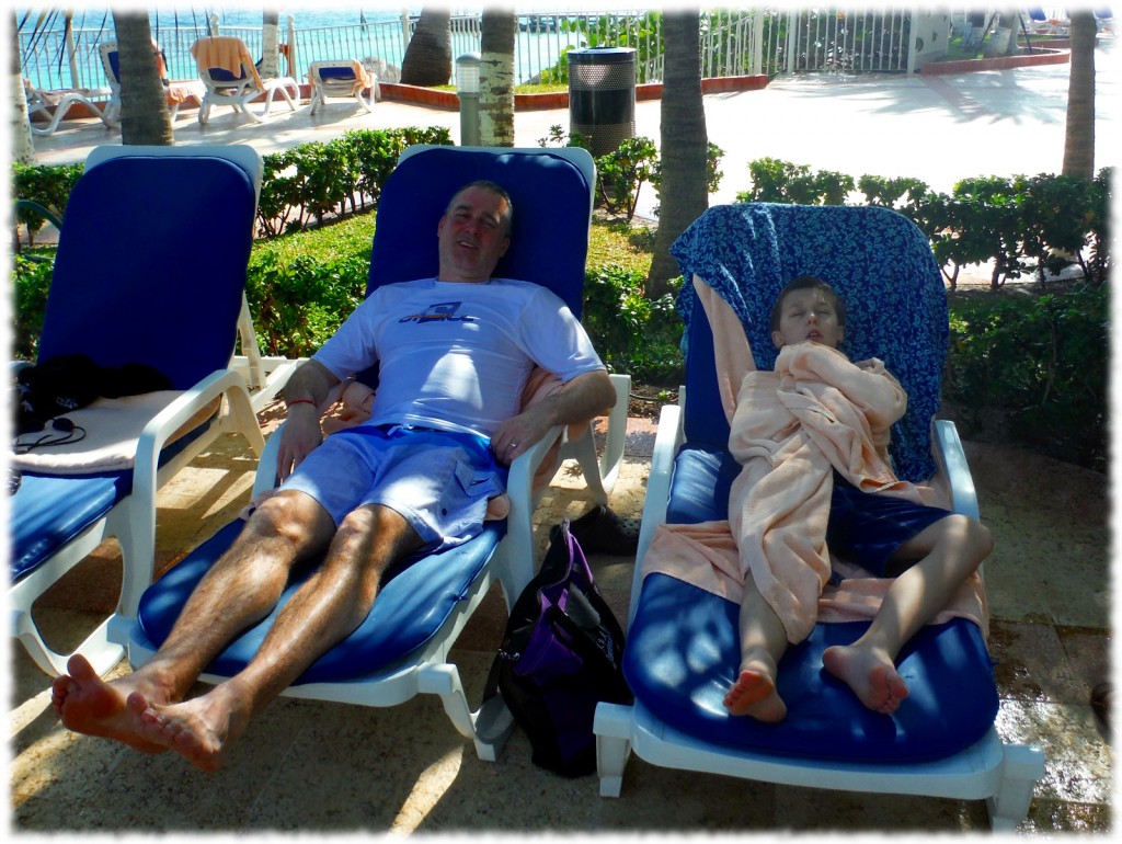 Enjoying the shade next to the pool.