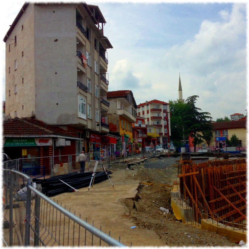 Thursday afternoon's lunch was in the buildings on the left of the picture. The center of the village had construction going on, building a car park and playground.