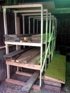 The lumber rack with most of the wood from the pile stacked on. I have lots of room for additional shelves (to be added one of these days).