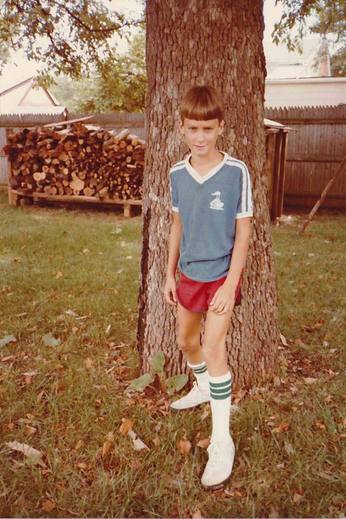 Showing off my soccer uniform (I think), September 1982