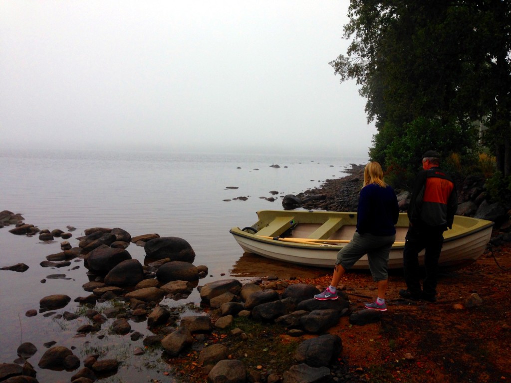 Susanna and her dad by his camp on the lake.