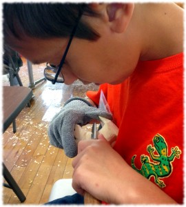 Ben hard at work carving his dog.