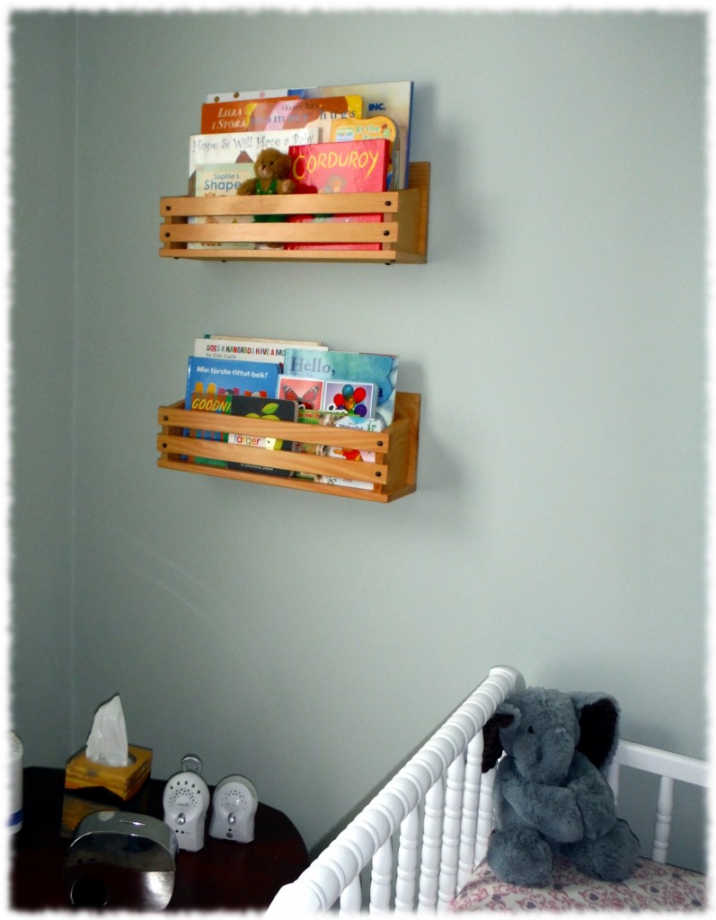 Book display shelves installed in the corner of the nursery.