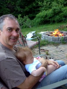 Hanging out by the fire. On a patio that needs to be cleaned up and a yard that needs to be mowed. But, there is always tomorrow to do chores.