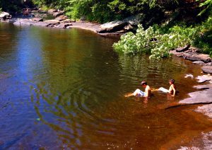 The boys testing the waters at Diana's Pool in Chaplin CT.