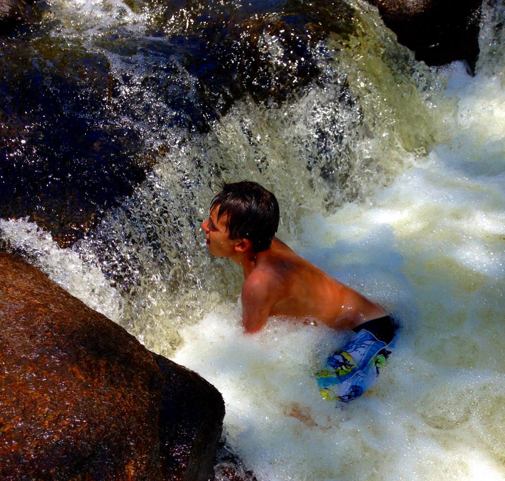 Ben playing in one of the waterfalls at Diana's Pool